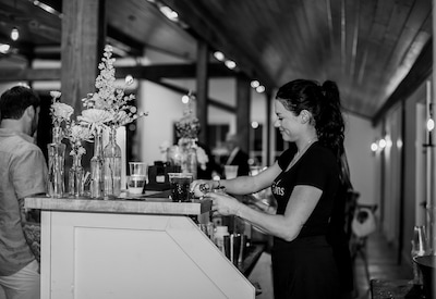 Kasey behind the bar at a Fly Libations event